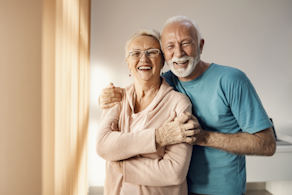 Life Assure Seniors Man And Woman Standing By Window Blog